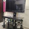 SAR 430,  HD LED TV With Glass Table And Stand