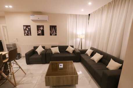 Abdoun, Apartments/Houses, JOD 12000/year,  Furnished,  2 BR,  Chic Abdoun Retreat: Furnished GF With Garden