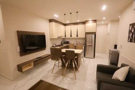 Abdoun, Apartments/Houses, JOD 12000/year,  Furnished,  2 BR,  Chic Abdoun Retreat: Furnished GF With Garden