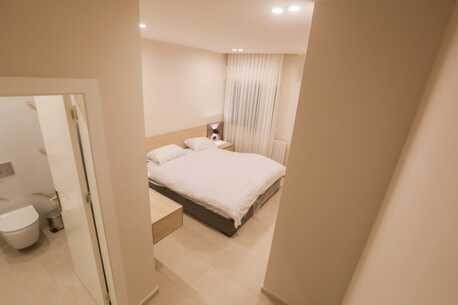 Abdoun, Apartments/Houses, JOD 12000/year,  Furnished,  2 BR,  Chic Abdoun Retreat: Furnished GF With Garden