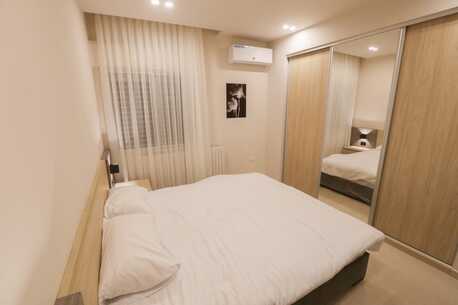 Abdoun, Apartments/Houses, JOD 12000/year,  Furnished,  2 BR,  Chic Abdoun Retreat: Furnished GF With Garden