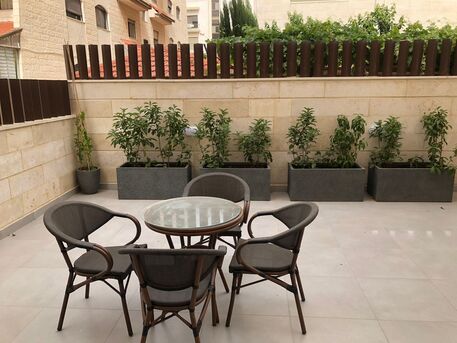 Abdoun, Apartments/Houses, JOD 13000/year,  Furnished,  2 BR,  Discover Your Perfect Ground-floor Haven In The Heart Of Abdoun