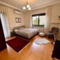 JOD 12500/year,  3 BR,  Furnished, 3 BR In 4th/ 5th Circle: Bright And Cozy Three-bedroom Apartment With Garden
