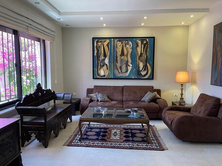 Amman, Apartments/Houses, JOD 12500/year,  3 BR,  Furnished, 3 BR In 4th/ 5th Circle: Bright And Cozy Three-bedroom Apartment With Garden