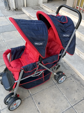 Khobar, Baby & Kid Stuff, SAR 125,  URGENT SALE- Double Baby Stroller &ndash; Red Black