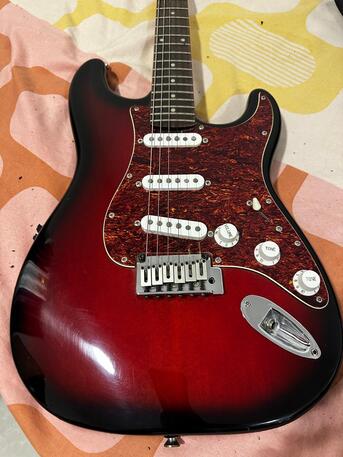 Dammam, Musical Instruments, SAR 890,  Fiery Red Electric Guitar - Stratocaster By Yamaha With Cover