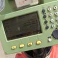 Land Surveyor With Total Station
