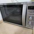 SAR 300,  Fully Functional Microwave/convection/Grill Combination 42L Sharp Inverter Microwave