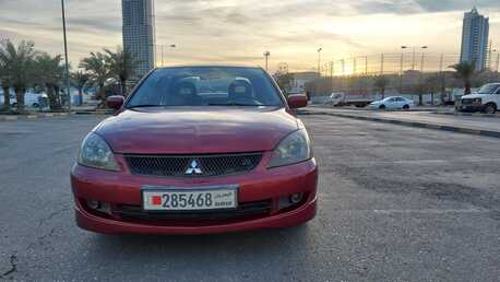 Manama, Vehicles, Cars & Trucks , BHD 1250,  Mitsubishi Lancer Lary Art 2.0 L Full Option Very Good Condation Single Ownar,  2007,  Automatic,  190000 KM,