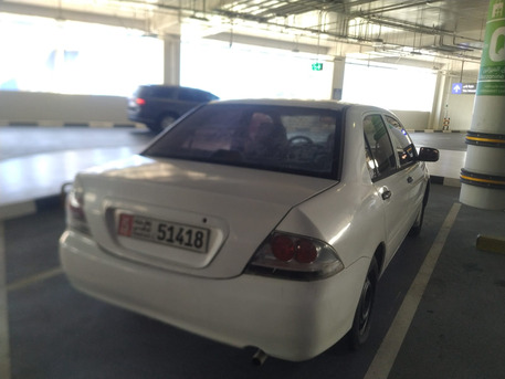 Abu Dhabi, Vehicles, Cars & Trucks , AED 4000,  Mitsubishi Lancer,  2006,  Automatic,  590000 KM,  &bull;	Old Car But Working,  1.3L Basic, Model , Odometer 590K Km