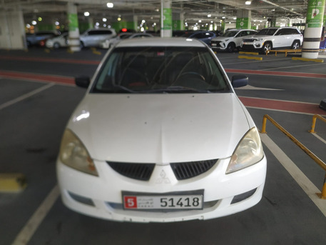 Abu Dhabi, Vehicles, Cars & Trucks , AED 4000,  Mitsubishi Lancer,  2006,  Automatic,  590000 KM,  &bull;	Old Car But Working,  1.3L Basic, Model , Odometer 590K Km