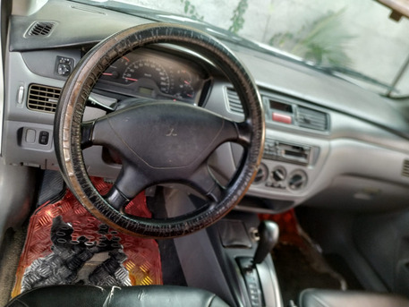 Abu Dhabi, Vehicles, Cars & Trucks , AED 4000,  Mitsubishi Lancer,  2006,  Automatic,  590000 KM,  &bull;	Old Car But Working,  1.3L Basic, Model , Odometer 590K Km