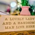 A Lovely Couple Lives Here &ndash; Charming Home Sign D?cor