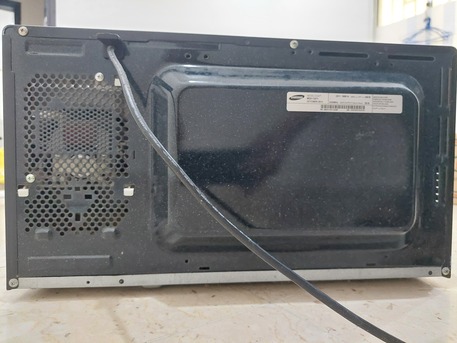 Dhahrat Laban, Appliances, SAR 225,  Samsung Microwave Oven - 32 Liters - Stainless Steel - Good Working Condition