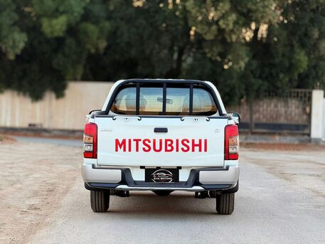 Manama, Vehicles, Cars & Trucks , BHD 5700,  MITSUBISHI L200,  2023,  Automatic,  117000 KM,   DOUBLE CABIN PICKUP  MODEL  WELL MAINTAINED