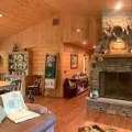 Log House Fireplace &ndash; Rustic Warmth | Call (800) 818-9971