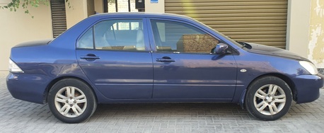 Manama, Vehicles, Cars & Trucks , BHD 1380,  Mitsubishi Lancer 2011,  2011,  Automatic,  168000 KM,   Well Maintained Car Engine Gear Ac 100%.