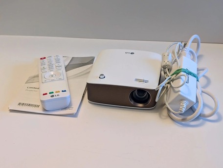 Manama, Electronics, BHD 85,  LG LED Smart Portable Projector Rechargeable With Remote & Adapter Good Working Condition