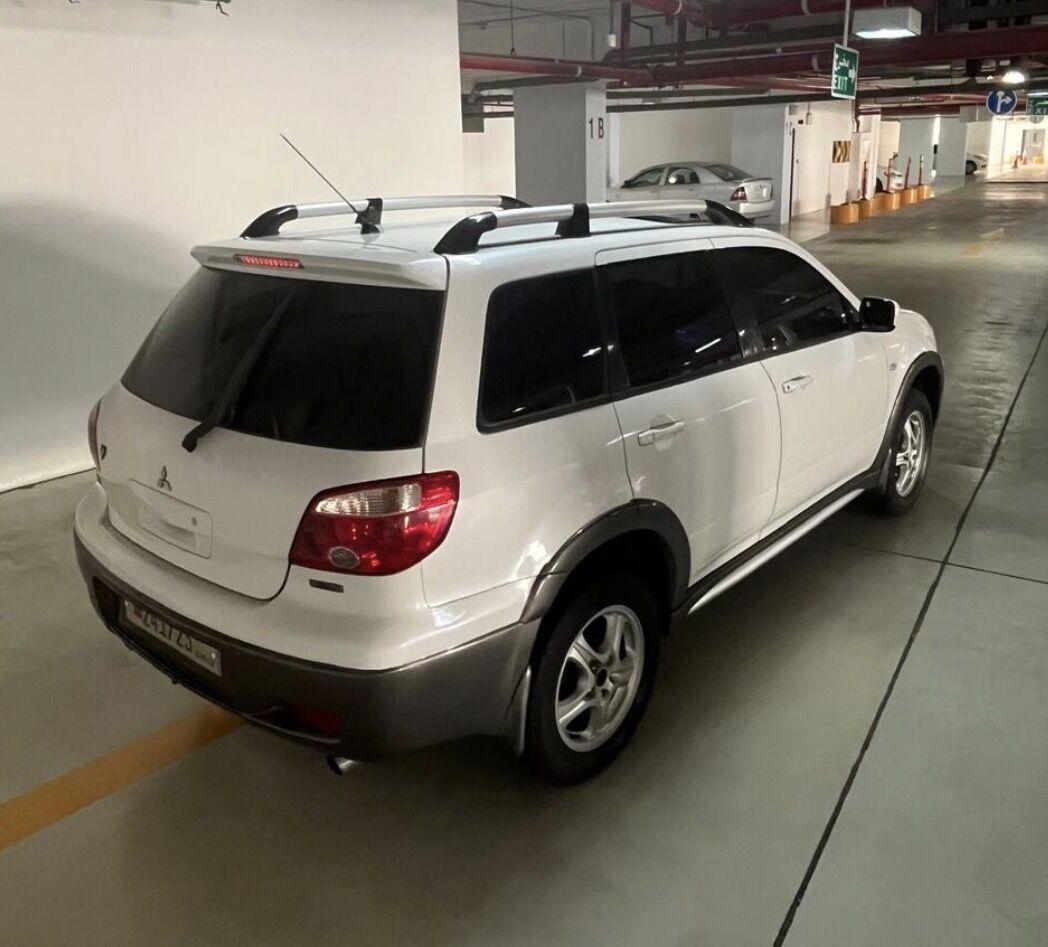 Manama, Vehicles, Cars & Trucks , BHD 1100,  Mitsubishi Outlander,  2005,  187 KM,  Clean Car Full Option.Low Mileage , Strong Car