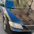 BHD 480, Mazda 323, 2004, Automatic, 100000 KM, Model For Sale