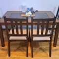 SAR 150,  Wooden Dining Table With Glass Centre
