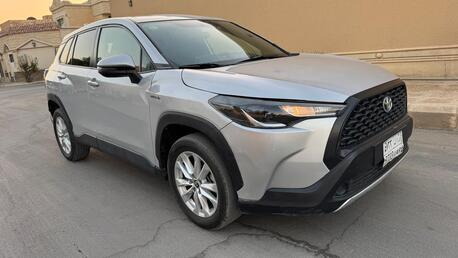 Riyadh, Vehicles, Cars & Trucks , SAR 57500,  TOYOTA COROLLA CROSS HYBRID H,  2022,  Automatic,  130000 KM,  HEV MID OPTION PUSH START SMART ENTRY