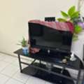 BHD 60,  TV With Tv Table And Cupboard And Another Table