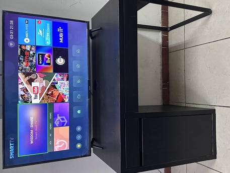 Al Thuqbah, Appliances, SAR 600,  HD LCD Smart TV With Table For Sale - Very Good Condition