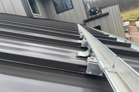 U.S. Virgin Islands, Construction, Snow Guard Installation In Eau Claire