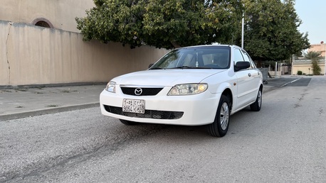 Dammam, Vehicles, Cars & Trucks , SAR 10000,  Mazda 323,  2001,  Manual,  65000 KM,  Clean
