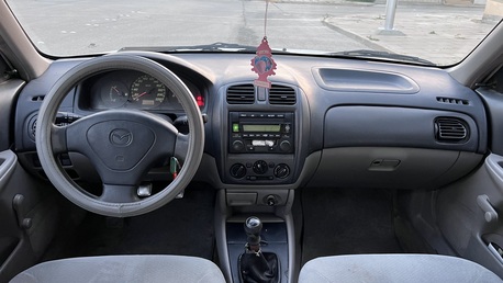 Dammam, Vehicles, Cars & Trucks , SAR 10000,  Mazda 323,  2001,  Manual,  65000 KM,  Clean