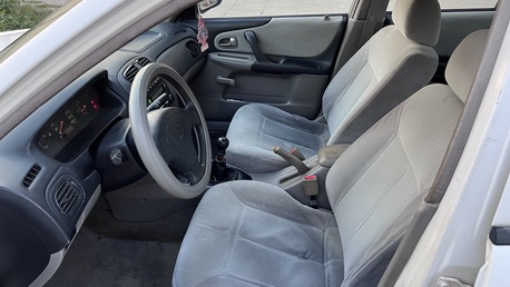 Dammam, Vehicles, Cars & Trucks , SAR 10000,  Mazda 323,  2001,  Manual,  65000 KM,  Clean