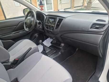 Manama, Vehicles, Cars & Trucks , BHD 5000,  Mitsubishi L 200 Pickup Dubble Cabain Imacalite Condation Single Ownar,  2023,  Manual,  50000 KM,
