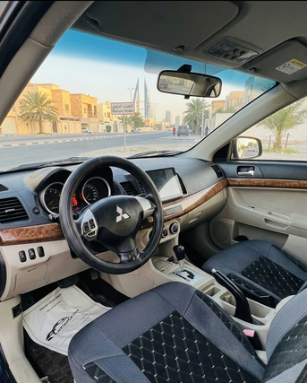 Ras Rumman, Vehicles, Cars & Trucks , BHD 1650,  Mitsubishi Lancer,  2011,  Automatic,  254000 KM,   -  - Stylish Colour - Well Maintained