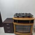 BHD 15,  Auto Ignition Gas Stove...TV Stand With Wheel And A Wardrobe.