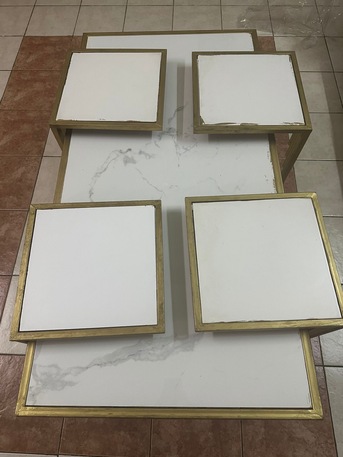 Al Wizarat, Furniture, SAR 50,  Modern Gold Nesting Tables Set With Marble-Style Tops (Used &ndash; Good Condition)