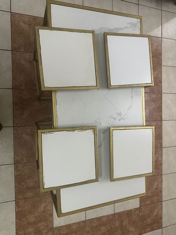 Al Wizarat, Furniture, SAR 50,  Modern Gold Nesting Tables Set With Marble-Style Tops (Used &ndash; Good Condition)