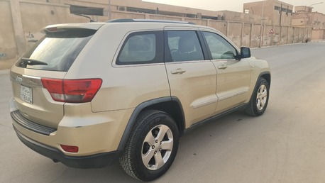 Al Shemaysi, Vehicles, Cars & Trucks , SAR 27000,  Jeep Grand Cherokee,  2012,  Automatic,  250000 KM,   Laredo  &ndash; 3.6L (Gold) For Sale