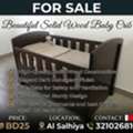 BHD 25,  Sturdy Wooden Baby Crib