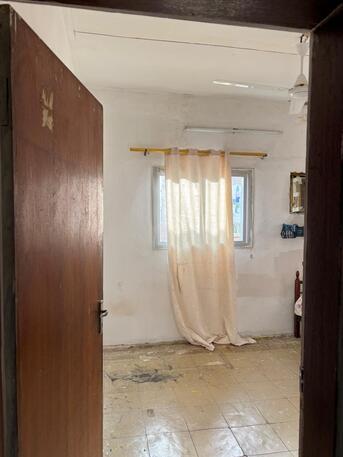 Umm Al Hassam, Rooms for Rent, BHD 95/month,  One Room In 2 Bedroom Flat For Rent Including Ewa