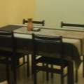 BHD 30,  4 Seater Black Wooden Dining Table With Chairs