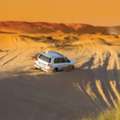 Evening Desert Safari Dubai &ndash; Dune Bashing, BBQ Dinner & Live Shows