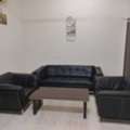 BHD 25,  2 Nos 1 Seater, 1 No. 3 Seater Sofa And Wooden Tea Table