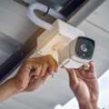 The System Typically Includes Surveillance Cameras (analog Or IP), Recording Devices Such