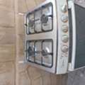 BHD 12,  Four Burner Gas Stove In Good Condition.