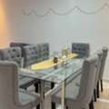 SAR 1750,  Dining Table With 8 Chairs. Glass Top & Fabric Chairs
