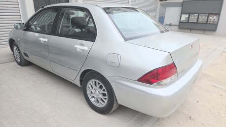 Sitra, Vehicles, Cars & Trucks , BHD 780,  Mitsubishi Lancer,  2002,  Automatic,  200000 KM,  Family Vehicle, Passed And Insured 2027 March
