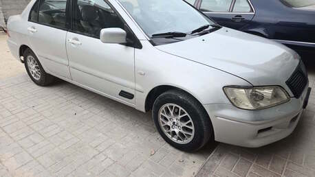 Sitra, Vehicles, Cars & Trucks , BHD 780,  Mitsubishi Lancer,  2002,  Automatic,  200000 KM,  Family Vehicle, Passed And Insured 2027 March