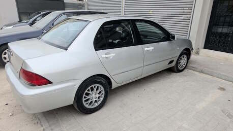 Sitra, Vehicles, Cars & Trucks , BHD 780,  Mitsubishi Lancer,  2002,  Automatic,  200000 KM,  Family Vehicle, Passed And Insured 2027 March
