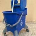 SAR 80,  Filmop Mop Bucket Trolley With MOP, 8 Gallon, Blue